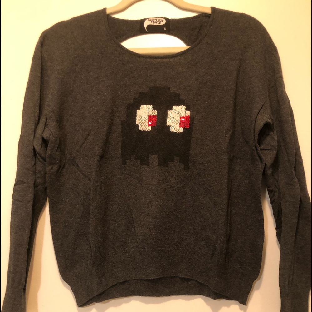 Packman sequin sweater with Suede elbow pads.